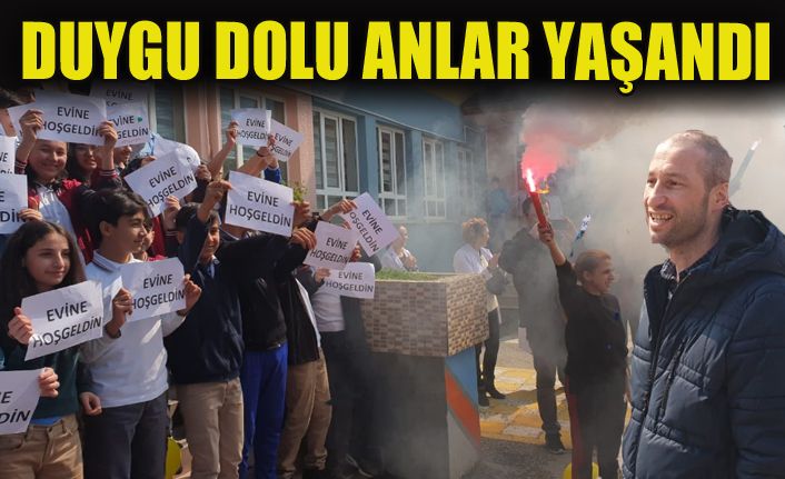 Kanseri yenen öğretmeni öğrencileri meşalelerle karşıladı