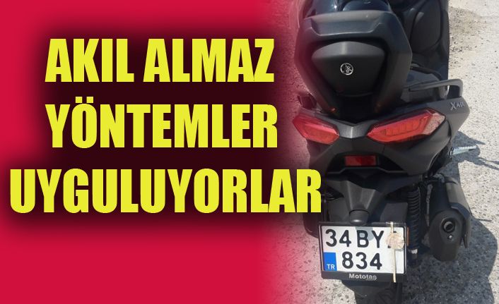 Plakayı çiçekle kapattı ama polisten kaçamadı