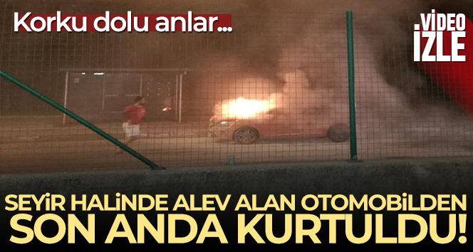 Seyir halinde alev alan otomobilden son anda kurtuldu