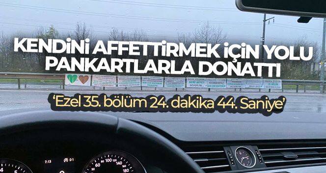 Kendini affettirmek için yolu pankartlarla donattı