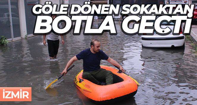 Göle dönen sokaktan botla geçti