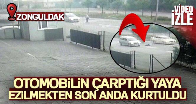 Otomobilin çarptığı yaya ezilmekten son anda kurtuldu