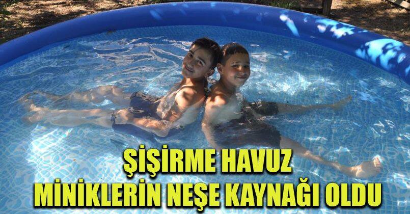 O köyde çocuklar için alınan şişirme havuz miniklerin neşe kaynağı oldu