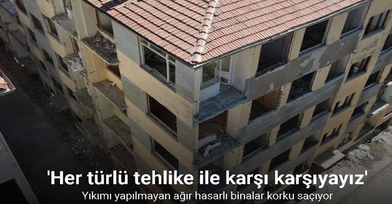 Yıkımı yapılmayan ve çevresinde önlem alınmayan ağır hasarlı binalar tehlike saçıyor