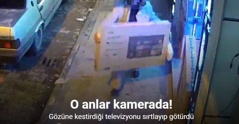 Gözüne kestirdiği televizyonu sırtlayıp götürdü, o anlar kameraya yansıdı