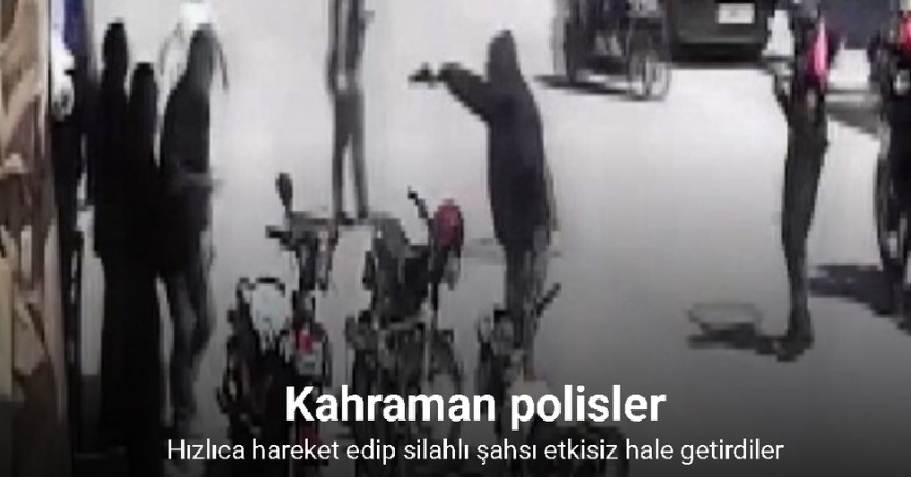 Polisin silahlı şahsa kahramanca müdahalesi kamerada