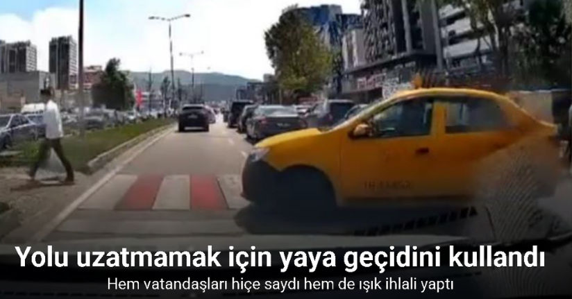 Yolu uzatmak istemeyen taksi, yaya geçidini kullandı