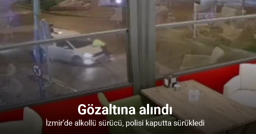İzmir’de alkollü sürücü, polisi kaputta sürükled