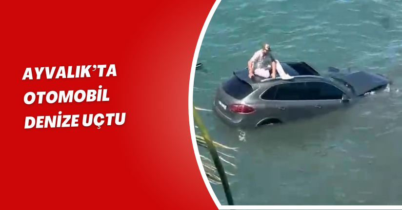 Ayvalık’ta otomobil denize uçtu