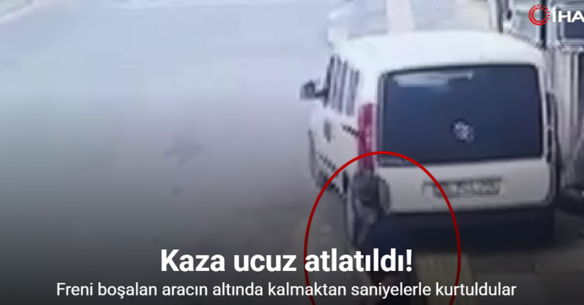 Freni boşalan aracın altında kalmaktan saniyelerle kurtuldular