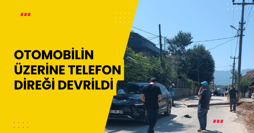 Otomobilin üzerine telefon direği devrildi