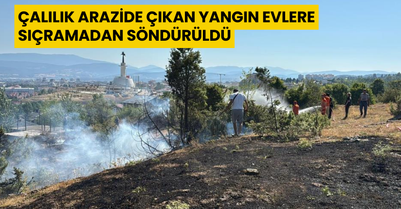 Çalılık arazide çıkan yangın evlere sıçramadan söndürüldü