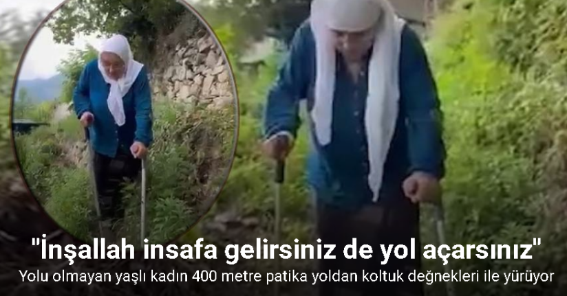 Yolu olmayınca 400 metre patika yoldan koltuk değnekleri ile yürüyor