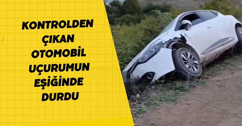 Kontrolden çıkan otomobil uçurumun eşiğinde durdu
