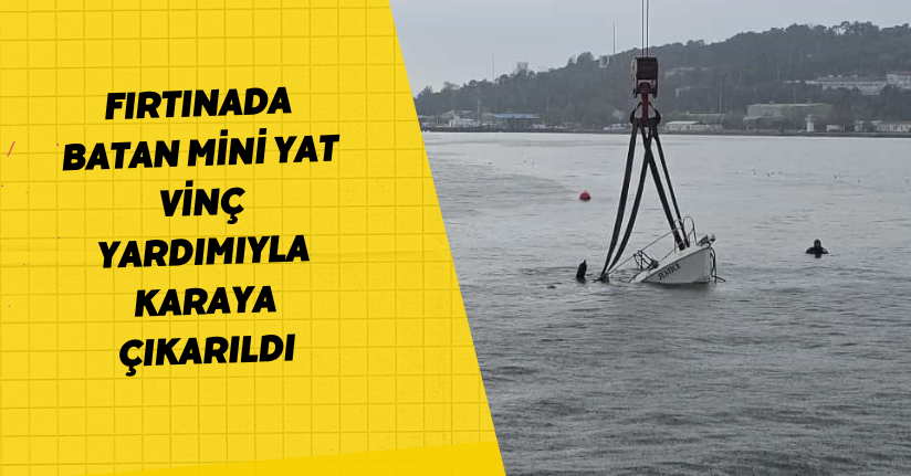 Fırtınada batan mini yat vinç yardımıyla karaya çıkarıldı