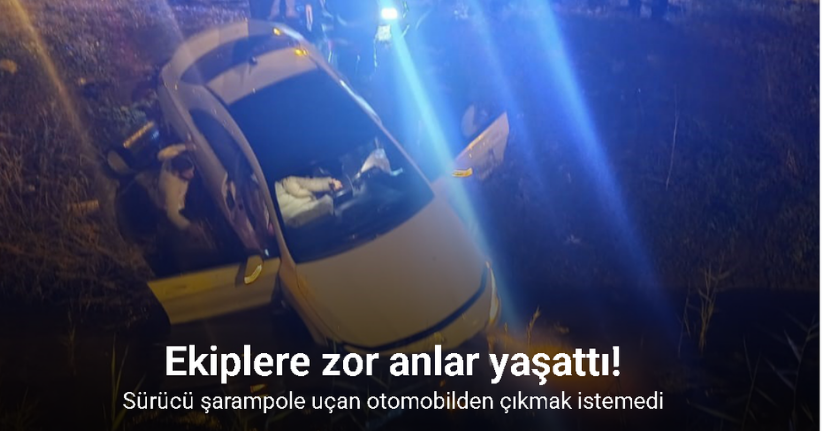 Şarampole uçan otomobilden çıkmak istemedi, ekiplere zor anlar yaşattı