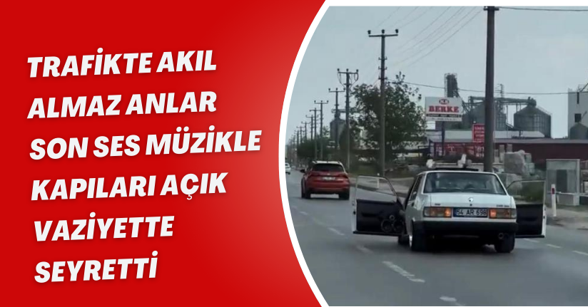 Trafikte akıl almaz anlar: Son ses müzikle kapıları açık vaziyette seyretti
