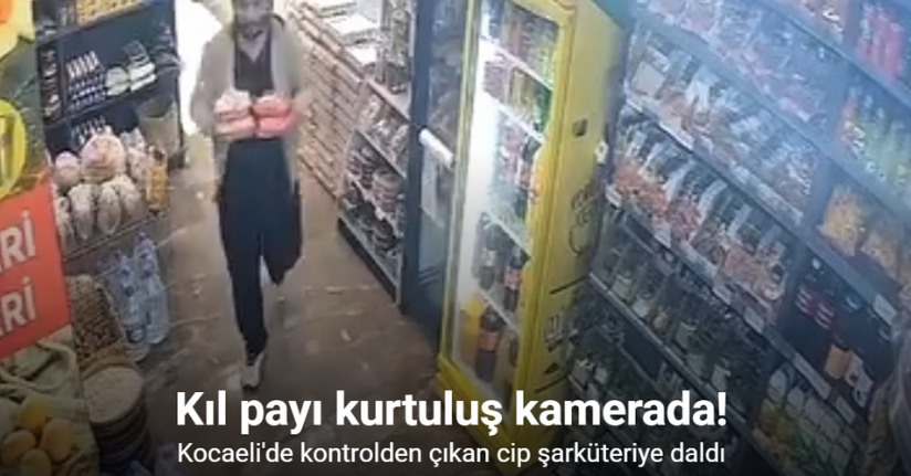 Kontrolden çıkan cip şarküteriye daldı: Kıl payı kurtuluş kamerada