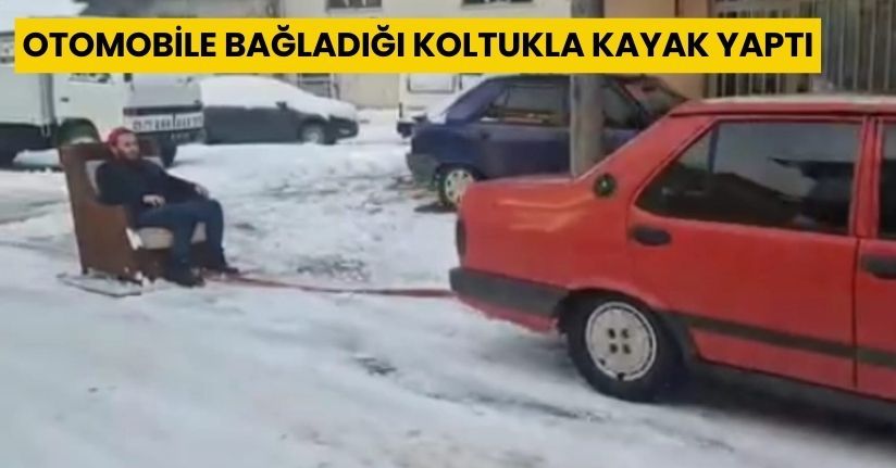 Otomobile bağladığı koltukla kayak yaptı