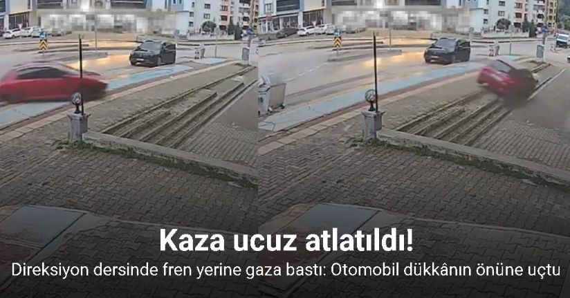 Direksiyon dersinde fren yerine gaza bastı: Otomobil dükkânın önüne uçtu
