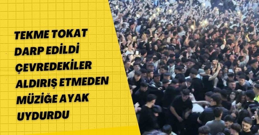 Tekme tokat darp edildi, çevredekiler aldırış etmeden müziğe ayak uydurdu