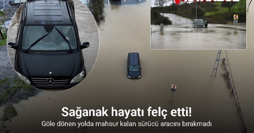 Göle dönen yolda mahsur kalan sürücü aracını bırakmadı, kurtarma anları görüntülendi