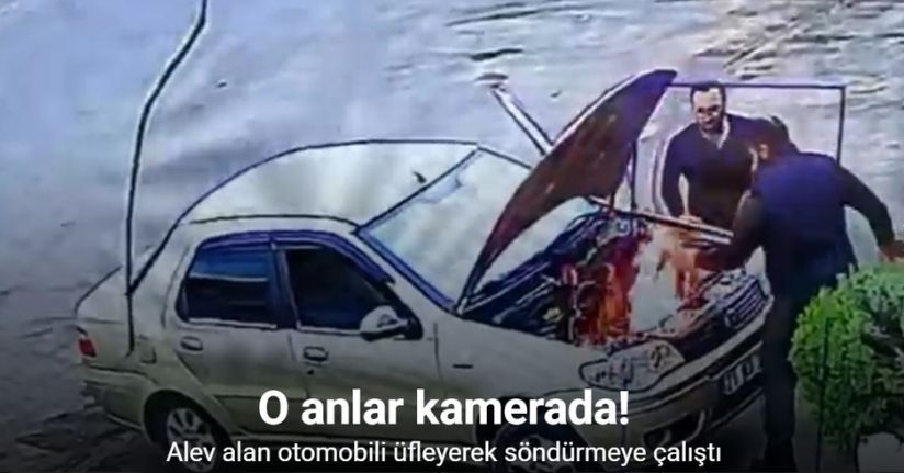 Alev alan otomobili üfleyerek söndürmeye çalıştı: O anlar kamerada