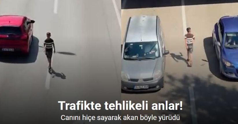 Canını hiçe sayarak akan trafikte böyle yürüdü