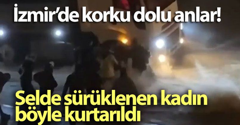 Selde sürüklenen kadının kurtarılma anı kamerada