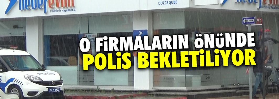 Tasfiye edilen firmaların önünde polis bekletiliyor