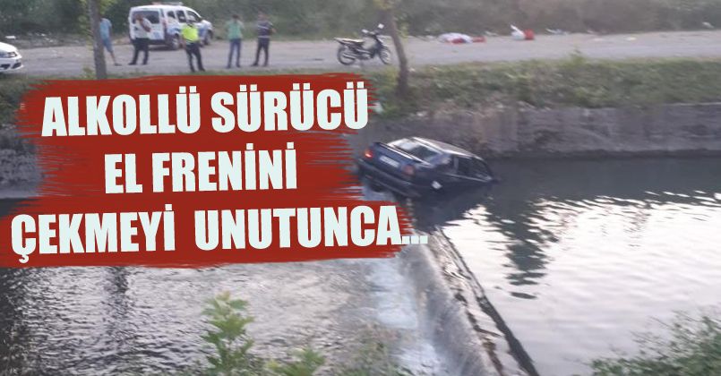 El frenini çekmeyi unuttuğu otomobili dereye düştü