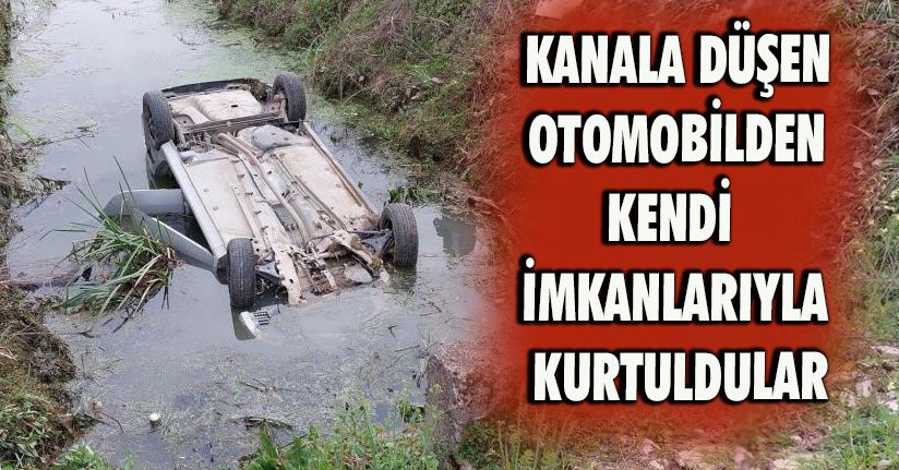 Kanala düşen otomobilden kendi imkanlarıyla kurtuldular
