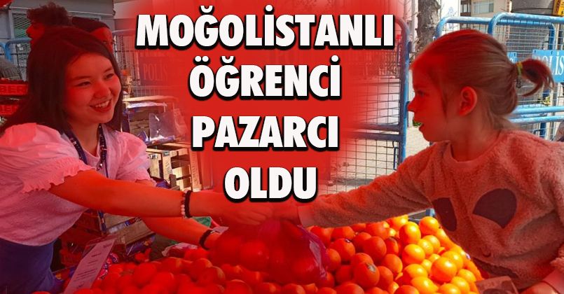 Moğolistanlı öğrenci pazar tezgahında portakal sattı